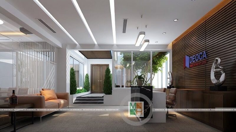 Bộ sofa bọc da màu cam hiện đại là điểm nhấn nổi bật cho không gian phòng chờ văn phòng Đèo Cả